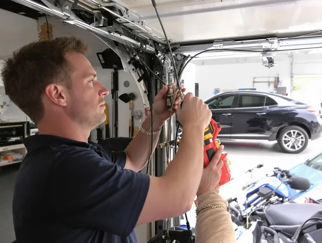 Beverly Hills Garage Door Repair safety certified technician performing cable replacement in Beverly Hills